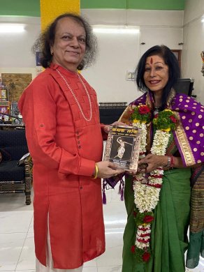 Shovana Narayan presents her newly released book Kathak Lok to Dr. Nandkishore Kapote